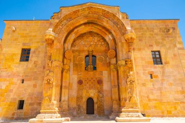 Gate of the Great Mosque and Hospital of Divrigi aka Divrigi Ulucamii ve Darussifasi literally in Turkish. clipart