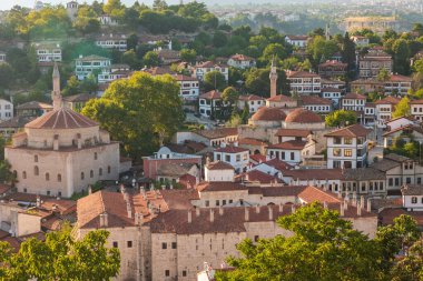 Safranbolu view at sunset. Visit Safranbolu background photo. Mosques and historical buildings. clipart