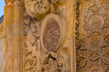 Carved stone decorations of Great Mosque of Divrigi aka Divrigi Ulucamii in Sivas Turkey. Unesco World Heritage building. clipart