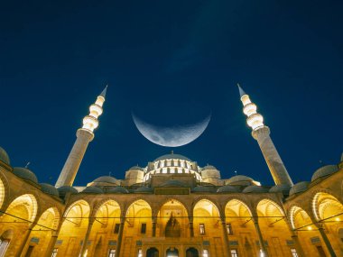 Ramadan or islamic or laylat al-qadr concept image. Mosque with crescent moon at night. Observe the five obligatory prayers especially the middle prayer text in photo. clipart