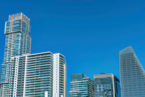 stock image Austin, Texas- Modern condominium and apartment buildings with different structures against the sky. Cityscape with skyscrapers with edgy architectural structures and glass exterior.