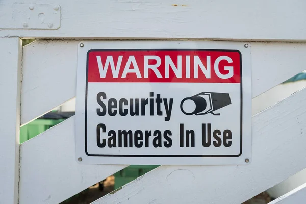 Destin Florida Sign Warning Security Cameras Use Wooden Gate Close — Stock Photo, Image