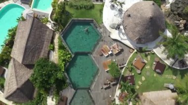 Aerial view of a hotel on the sea coast in Bali. High quality 4k footage