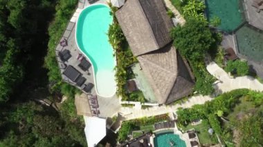 Aerial view of a hotel on the sea coast in Bali. High quality 4k footage