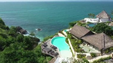 Aerial view of a hotel on the sea coast in Bali. High quality 4k footage