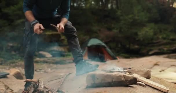 Male Tourist Chops Firewood Small Campfire Forest Traveler Prepares Wood — Stock Video