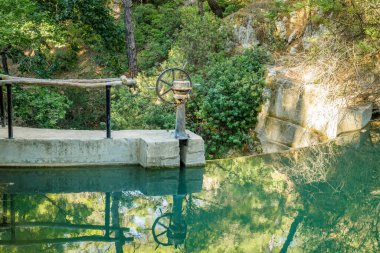 Lake in The seven springs waterfall forest area in the island of Rhodes, Greece, Europe.