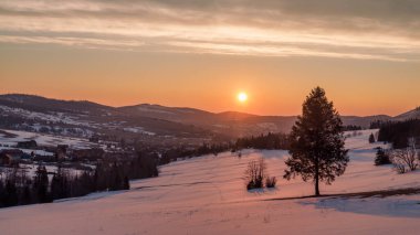The distinctive village of Zdiar at winter sunrise. High Tatras National Park, Slovakia, Europe.