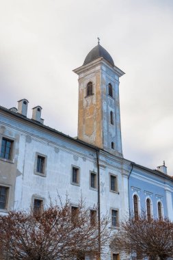 Franciscan church in a square in historic centre of Kremnica, Slovakia, Europe.