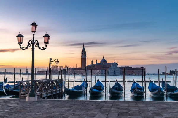 stock image View of San Giorgio Maggiore Island with gondolas from San Marco square in Venice at sunrise, Italy, Europe.