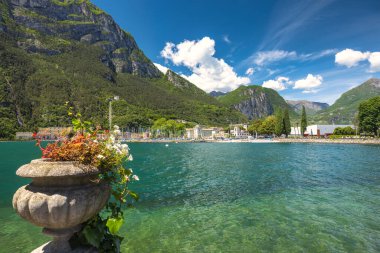 Lake Garda with mountains in background, view from Riva del Garda town shore, Italy, Europe. clipart