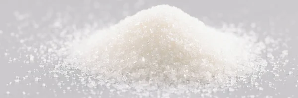 Großaufnahme Von Zuckerkristallen Auf Grauem Hintergrund Haufen Von Süßem Pulver — Stockfoto