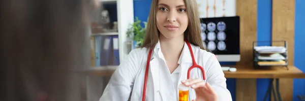 Portrait Female Doctor Give Patient Plastic Container Filled Medication Intern — ストック写真