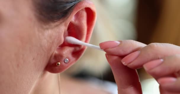 Girl Cleans Ears Stick Removes Earwax Woman Shelf Ears Hygiene — Stock Video