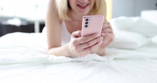 Woman Texting Smartphone While Lying Bed Home Chat Apps Concept — Stock Video