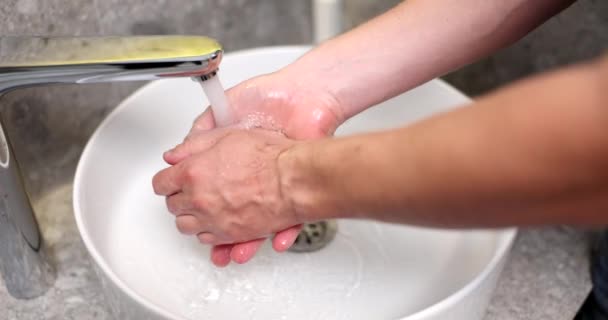 Young Man Thoroughly Washing Hands Soapy Water Closeup Taking Care — Stock Video