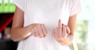 Female hand showing middle finger gesture meaning in western cultures Fuck you or fuck you. Gesture of aggression and negative emotions