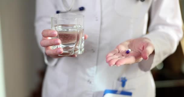 Doctor Hand Giving Capsule Medical Drug Glass Water Closeup Movie — Stock Video