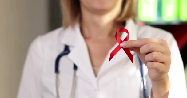 Doctor Holds Red Ribbon Hand Finger Symbol Fight Aids Solidarity — Stock Video