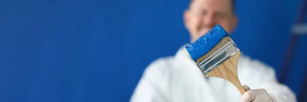 Close Painter Worker Hold Brush Covered Blue Colour Paint Handyman — Stock Photo, Image