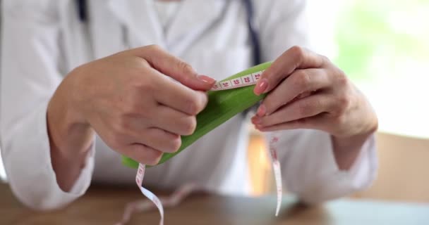 Doctor Urologist Holds Measuring Ruler Cucumber Penis Penis Enlargement Concept — Stockvideo