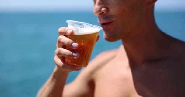 Man Drinks Beer Beach Plastic Cup Beach Party Cold Beer — Wideo stockowe