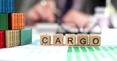 Businessman considers cost of cargo delivery on calculator. Marketing or financing planning logistics services and expected revenue