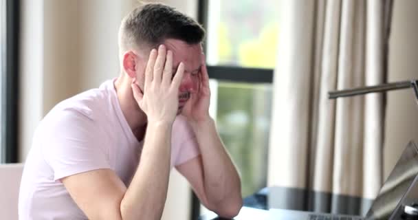 Frustrated Freelancer Sitting Home Front Laptop Closing Eyes Man Overworked — Vídeos de Stock