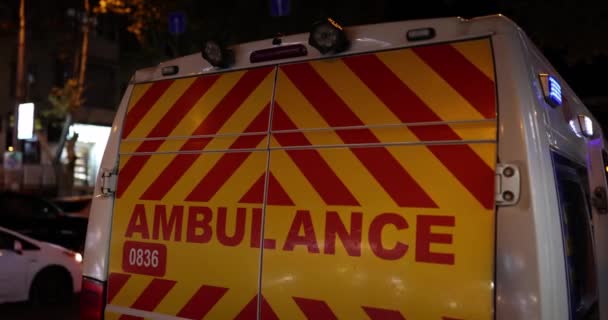 Ambulance City Street Evening Providing Urgent Medical Care — Stockvideo