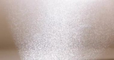 Colorful lights white bright snow or dust background. Light particles fly in sky air and blurred dust particles motion effect