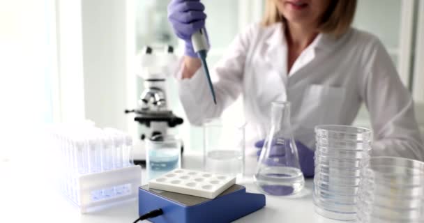 Scientist Chemist Pouring Acid Test Tube Cells Closeup Movie Slow — Vídeo de stock