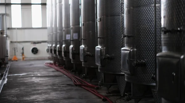 Metal containers tanks production of alcoholic wine products. Production equipment of chemical and pharmaceutical industries concept