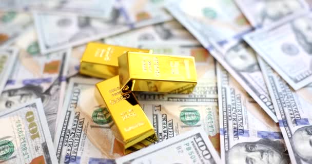 Gold Bars Lying Set Dollar Bills Closeup Movie Slow Motion — Vídeos de Stock