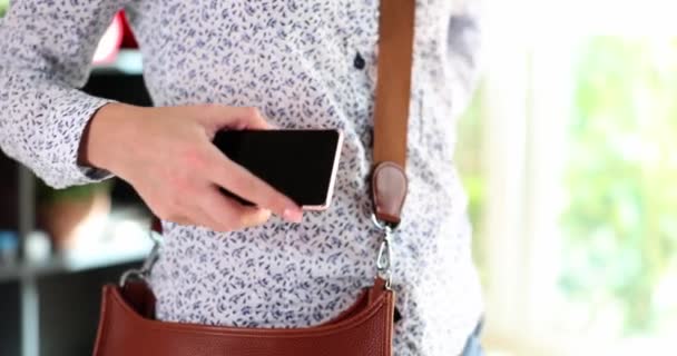 Woman Putting Mobile Phone Leather Handbag Closeup Movie Slow Motion — Video Stock