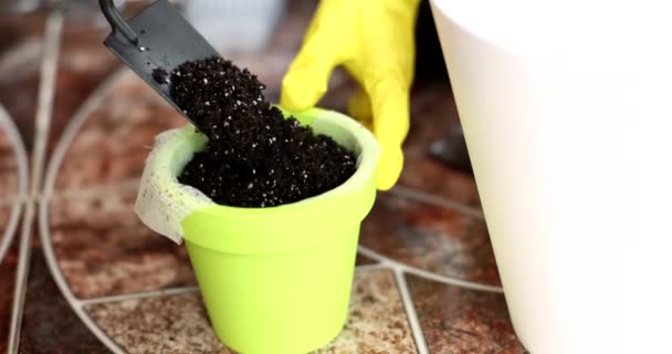 Gardener Pouring Earth Plant Pot Shovel Closeup Movie Slow Motion — 비디오