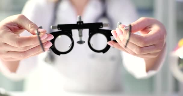 Doctor Ophthalmologist Giving Glasses Patient Check Vision Clinic Closeup Movie — Wideo stockowe