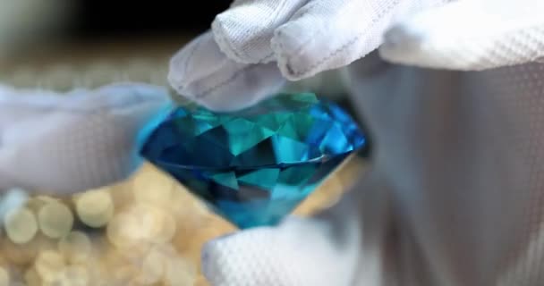 Beautiful Large Brilliant Cut Blue Diamond Hands Jeweler Gloves Gemological — стоковое видео