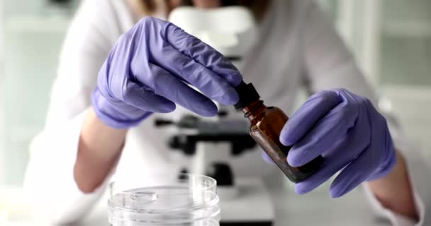 Pharmacist Opens Dropper Drop Natural Oil Glass Bottle Laboratory Testing — Vídeo de stock