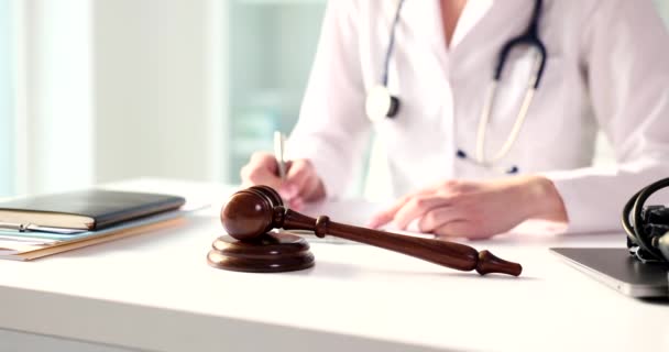 Judicial Hammer Stethoscope Table Doctor Writes Notes Medical Document Medical — Vídeo de Stock