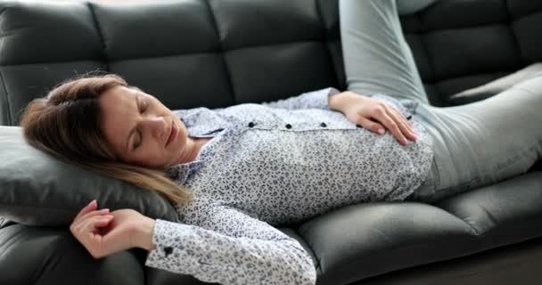 Tired Woman Shirt Sleeping Sofa Home Movie Slow Motion Lunch — kuvapankkivideo