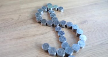 İş ve para kavramı ve Amerikan Doları işaretli madeni paralar. Finansal para yatırımı