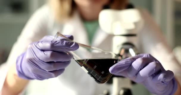 Laboratory Assistant Scientist Holds Test Tubes Examines Oil Products Scientific — Video Stock