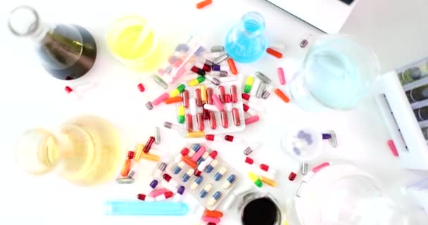 Multicolored Medical Pills Flasks Liquids Laboratory Drug Development Concept — Wideo stockowe
