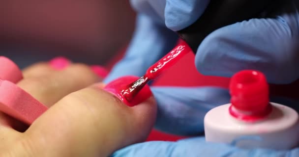 Pedicure Master Starts Painting His Nails Red Polish Pedicure Services — Vídeo de stock