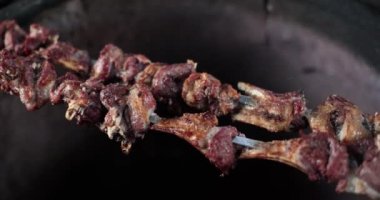 Barbecue lamb ribs cooking outdoors grilled meat. Grilled meat skewers