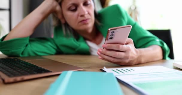 Thoughtful Woman Looking Smartphone Screen While Thinking Gadget Problem Manager — Video Stock