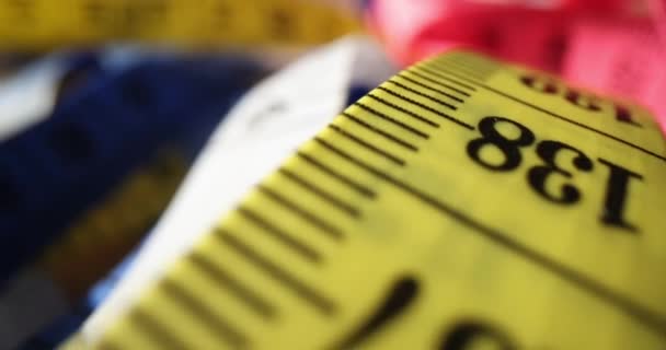 Many Multicolored Measuring Tape Background Measuring Fabrics Tailoring — Vídeo de Stock