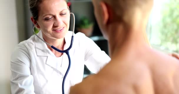 Female Doctor Using Stethoscope Makes Diagnosis Heartbeat Patient Health Insurance — Stock videók