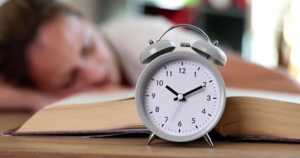 Tired Woman Sleeps Table Alarm Clock Book Overwork Preparation Exams — Stock videók