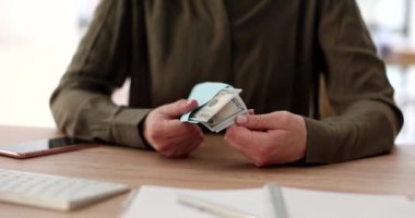 Woman hands count cash dollar money in envelope at workplace. Bribery corruption and money laundering scheme
